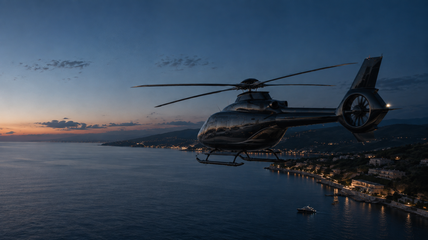 Piano Black helicopter flying above the coast at blue hour.